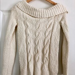Cream - Off the shoulder sweater.